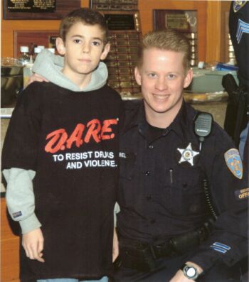 Cody Hubert and Salem Police D.A.R.E. Officer Craig Seibel